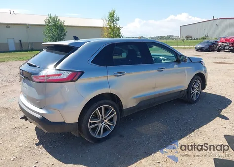 2022 Ford Edge Titanium z USA, uszkodzony, nr VIN 2FMPK4K91NBA97190